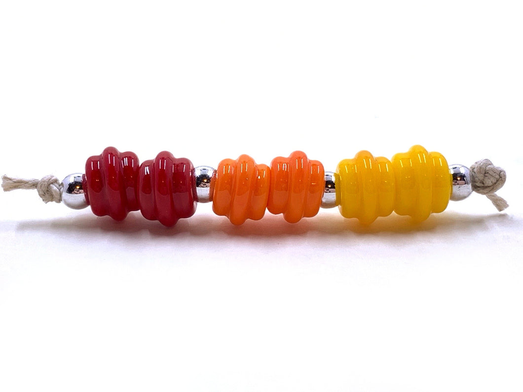 Ribbed Spacers - red, yellowish opal orange, and lemon yellow